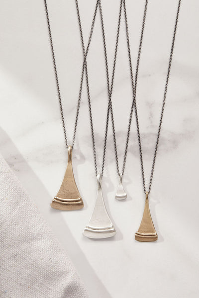 Necklace Layering Guide: 8 Easy Tips to get you Layering Like a Pro!